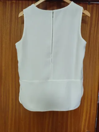 Blusa blanca sin mangas