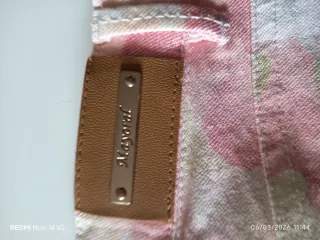 Pantalones niña estampado floral talla 7 años.