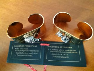 2 portatovaglioli dorati con ananas