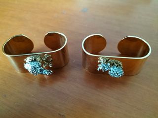 2 portatovaglioli dorati con ananas