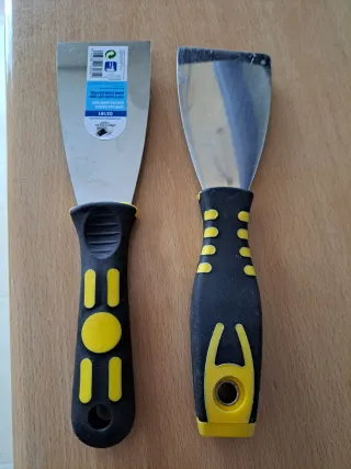 Lote 2 espátulas mango negro y amarillo