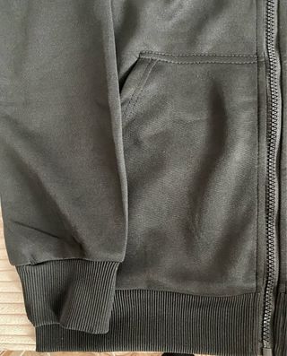 Sudadera The North Face gris y negra