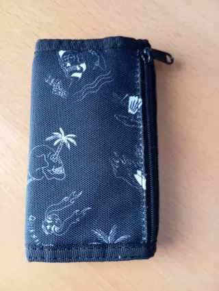 Cartera Quiksilver calaveras