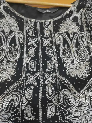 Top lentejuelas negro y plateado