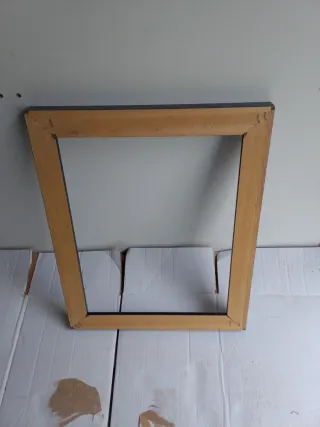 Marco de madera negro y dorado