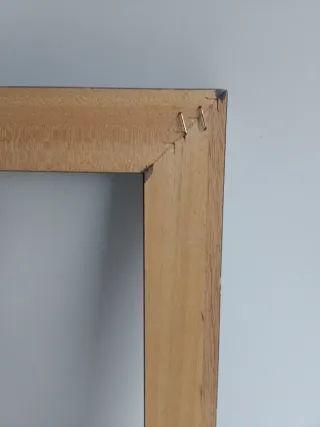 Marco de madera negro y dorado