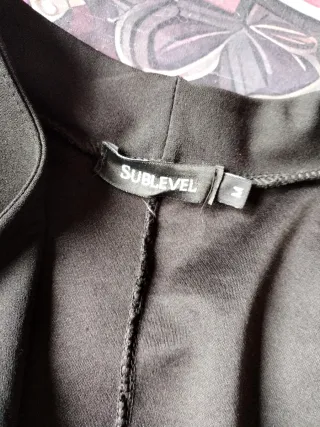 Giacca nera con  coulisse in vita