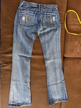 Jeans Peuque tiro bajo desgastados