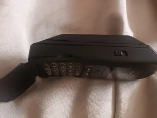 Teléfono Motorola 1995 con cargador y funda