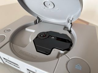 PlayStation 1 + 2 Controller + Moto Racer 2