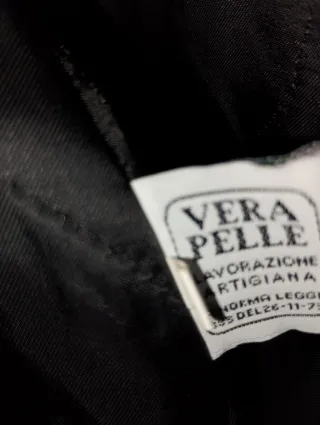 Cappotto in pelle con pelliccia