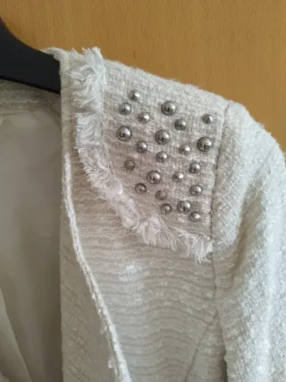 Chaqueta bolero torera negra y otra tipo chanel