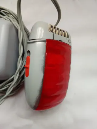 Depiladora Philips Roja y Plateada