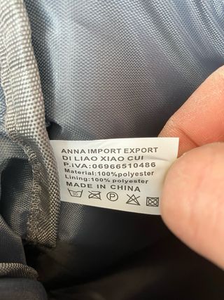 Zaino grigio con dettagli marroni