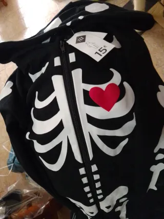 Mono esqueleto talla 15-16 años, espalda negra.