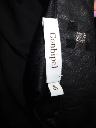 Abito donna nero con inserti luminosi.