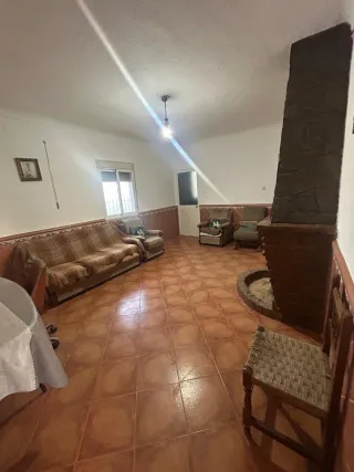 Terreno rustico con casa de campo dos naves y una