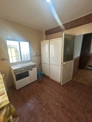 Terreno rustico con casa de campo dos naves y una