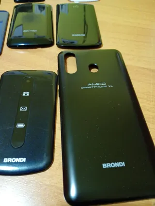 LOTTO DI 11 SCOCCHE ORIGINALI PER TELEFONI BRONDI