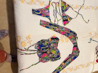 Conjunto bikini, minifalda y manguitos