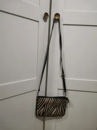 Bolso de cuero y piel de potro estampado cebra