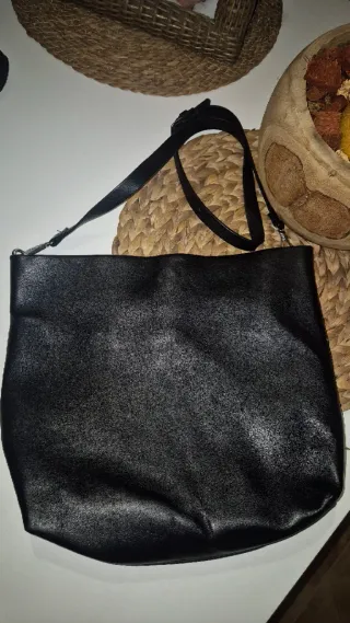 Bolso de piel verde y estampado cebra