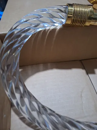 Toallero de cristal y metal dorado