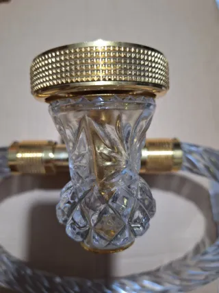 Toallero de cristal y metal dorado