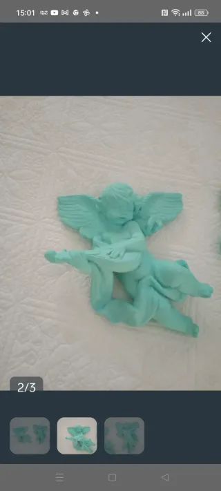 Coppia di angeli decorativi turchese