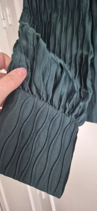 Blusa verde con botones dorados