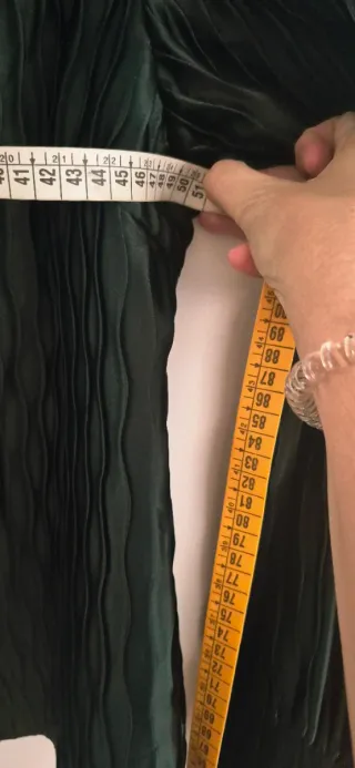 Blusa verde con botones dorados