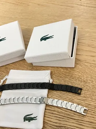 Pulseras Lacoste Negras y Plateadas