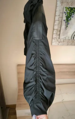 Cazadora negra Amitié