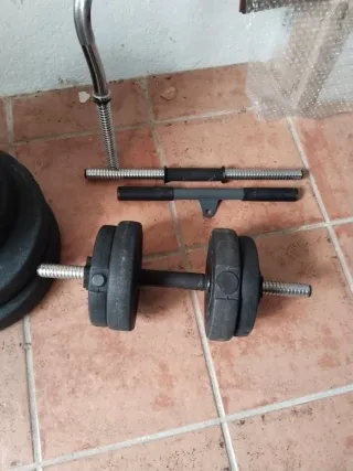 Conjunto de pesas y barra