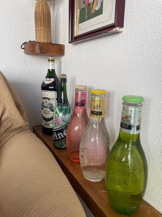 Juego botellas grandes.