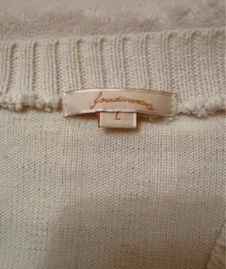 Chaqueta corta de punto blanco