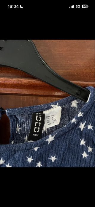 Top azul marino estrellas espalda semidescubierta