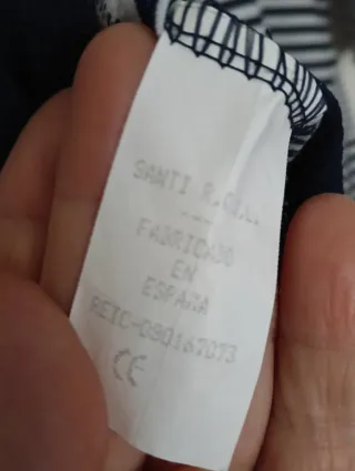 Camiseta rayas azul y blanca con diseño en espalda