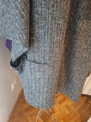 Casaca de punto gris y negra talla XL