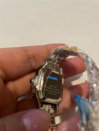 Reloj C**tier, plateado con diamantes