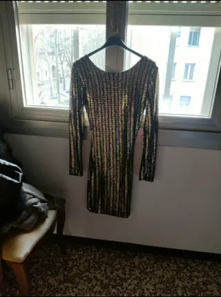 Vestito elegante paillettes oro e argento