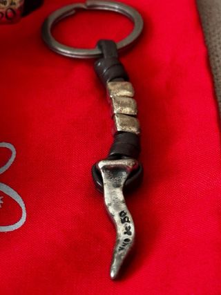 Uno de 50 Pulseras y Llavero URGE