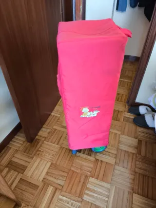 Parque cuna de viaje con ruedas