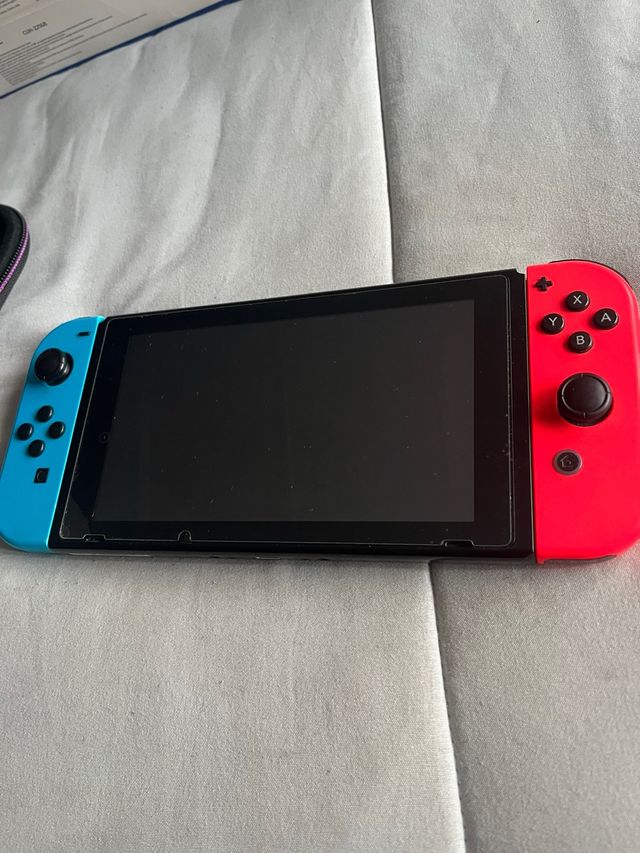 Nintendo Switch + Mando Extra