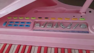 Piano rosa de juguete