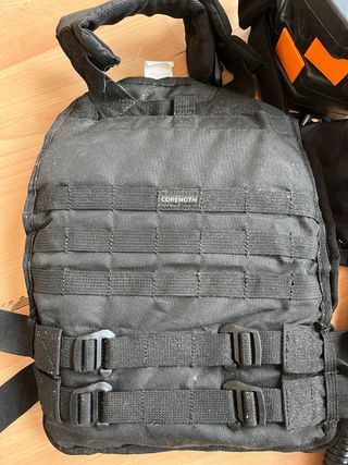 Pesas y chaleco de entrenamiento