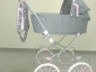 Carro muñecas juguete