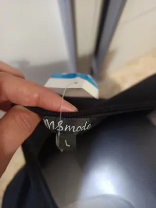 Blusa negra mujer con volantes