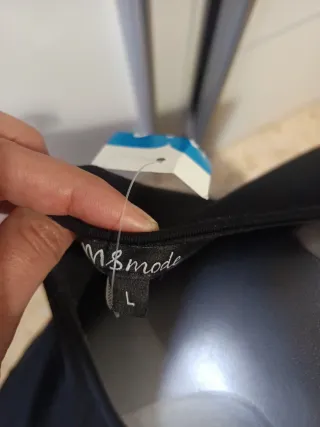 Blusa negra mujer con volantes