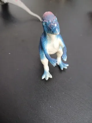 Dinosauro blu giocattolo